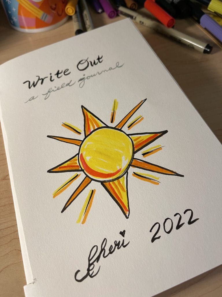 science field journal cover with stylized sun art
